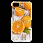 Coque Blackberry Z10 Belles oranges sur fond en bois