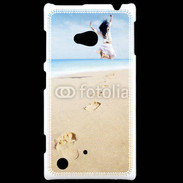 Coque Nokia Lumia 720 Femme sautant face à la mer