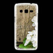Coque Samsung Galaxy Express2 Fleurs sur fond en bois