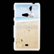 Coque Nokia Lumia 625 Femme sautant face à la mer