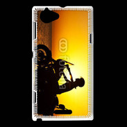 Coque Sony Xperia L Femme biker au couché de soleil