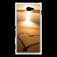 Coque Sony Xperia M2 Coeur sur la plage avec couché de soleil
