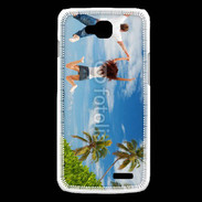 Coque LG L90 Couple sautant devant la mer