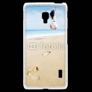 Coque LG F6 Femme sautant face à la mer