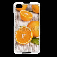 Coque Blackberry Z30 Belles oranges sur fond en bois