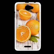 Coque HTC Desire 516 Belles oranges sur fond en bois