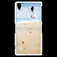 Coque Sony Xperia Z2 Femme sautant face à la mer