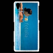Coque Sony Xperia Z2 Femme sirotant un cocktail face à la mer