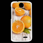 Coque HTC Desire 310 Belles oranges sur fond en bois