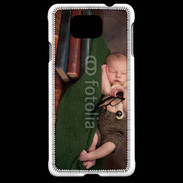 Coque Samsung Galaxy Alpha Bébé dormant sur des livres