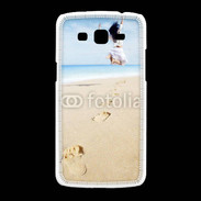 Coque Samsung Galaxy Grand2 Femme sautant face à la mer