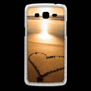 Coque Samsung Core Plus Coeur sur la plage avec couché de soleil