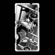 Coque Sony Xpéria SP Femme sur un banc de musculation