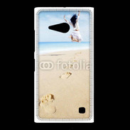Coque Nokia Lumia 735 Femme sautant face à la mer