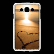 Coque LG L60 Coeur sur la plage avec couché de soleil