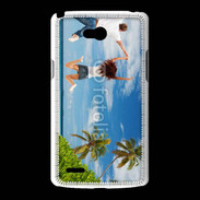 Coque LG L80 Couple sautant devant la mer