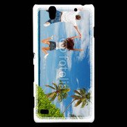 Coque Sony Xperia C4 Couple sautant devant la mer