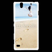 Coque Sony Xperia C4 Femme sautant face à la mer