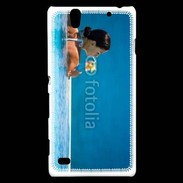 Coque Sony Xperia C4 Femme sirotant un cocktail face à la mer