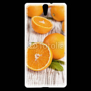 Coque Sony Xperia C5 Belles oranges sur fond en bois