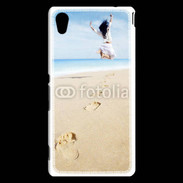 Coque Sony Xperia M4 Aqua Femme sautant face à la mer