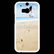 Coque HTC One M8s Femme sautant face à la mer