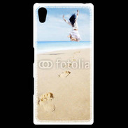 Coque Personnalisée Sony Xpéria Z5 Femme sautant face à la mer