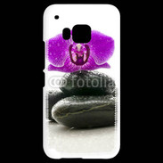 Coque HTC One M9 Orchidée violette sur galet noir