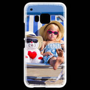 Coque HTC One M9 Petite fille avec bonhomme de neige a la plage
