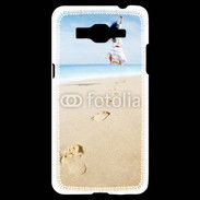 Coque Samsung Grand Prime 4G Femme sautant face à la mer